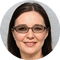 Woman with glasses and white hat