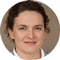 Woman in white shirt and tie