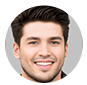 Man with a beard smiling at camera